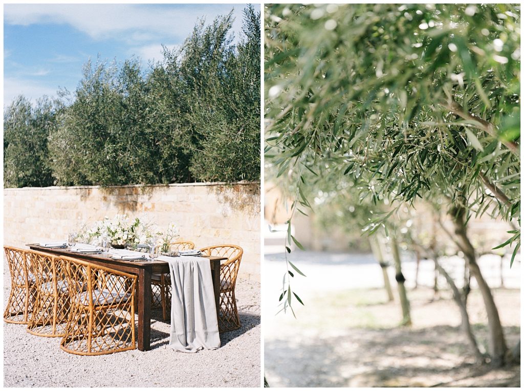Olive trees in the background of an intimate wedding reception table.