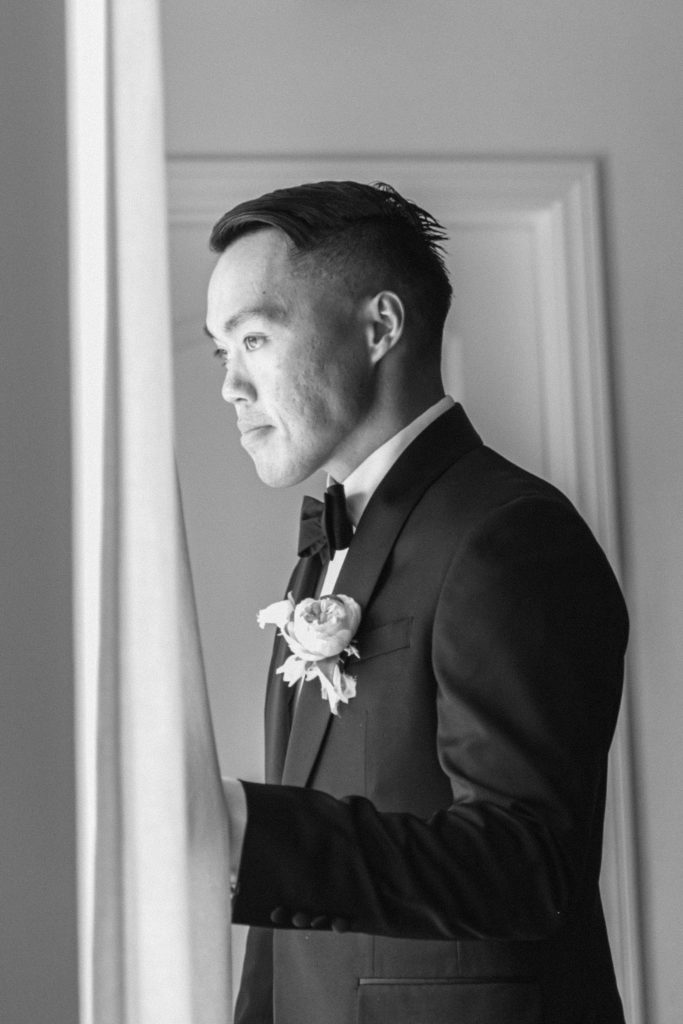 Groom getting ready for private residence wedding